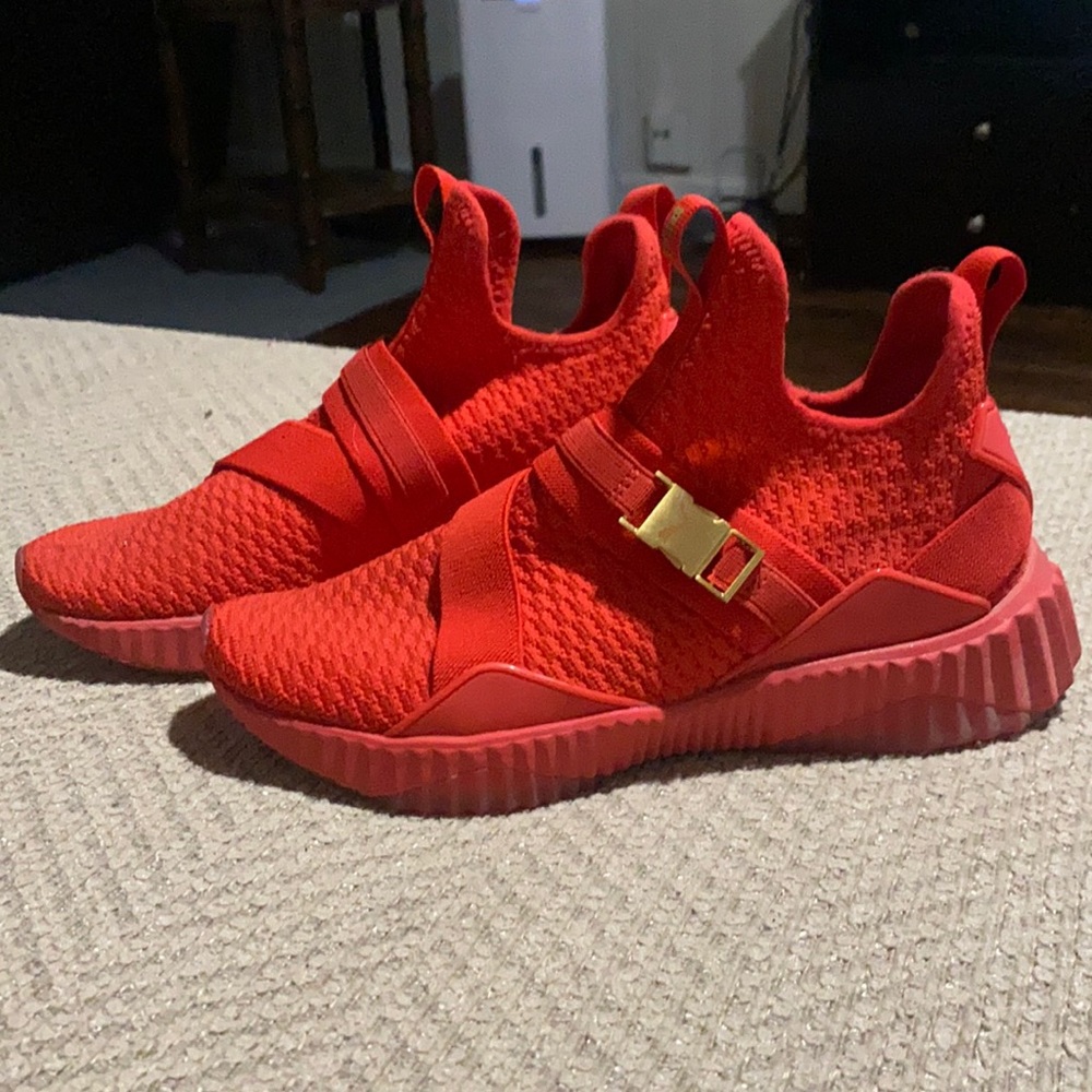 Red puma shoes